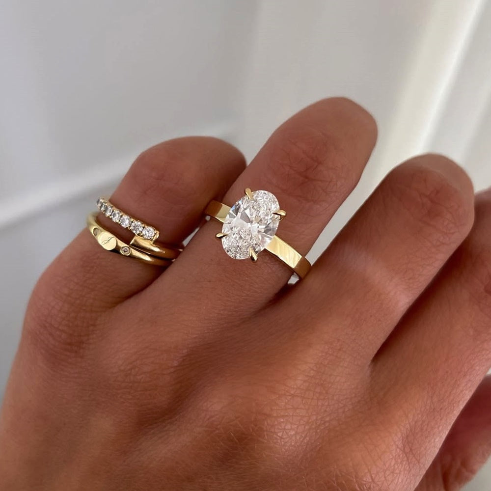 Oval Cut Flat Band Solitaire